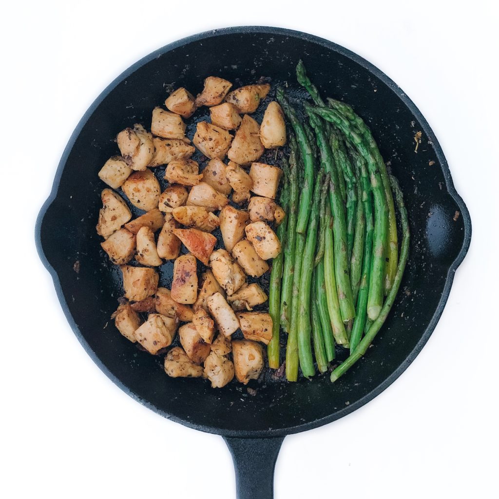 one-pan garlic butter chicken bites with lemon asparagus