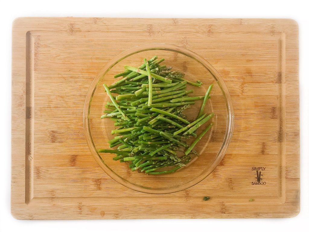 prepared asparagus in a clear dish