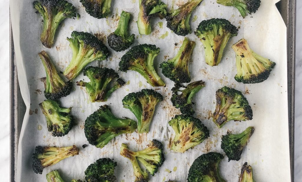 Roasted Frozen Broccoli on a sheet pan close-up
