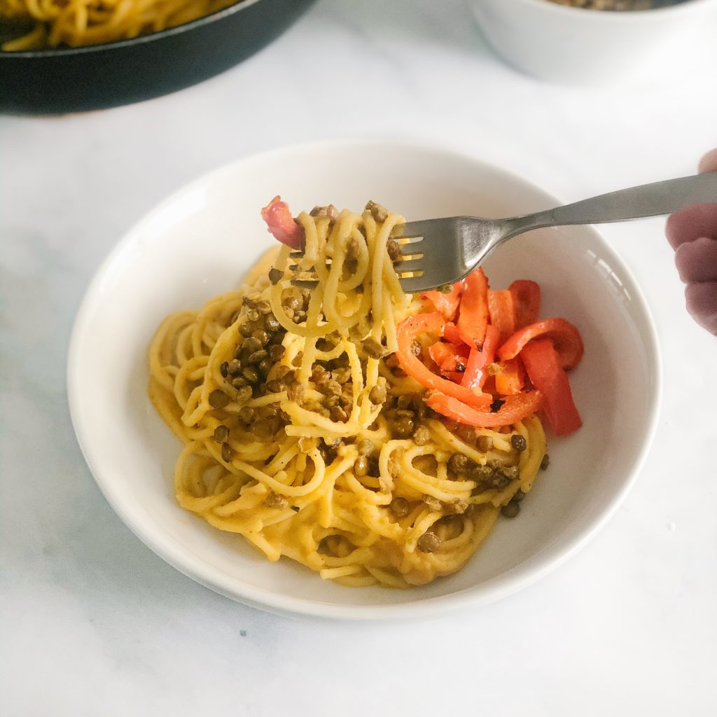 creamy vegan butternut squash pasta with roasted peppers and lentils