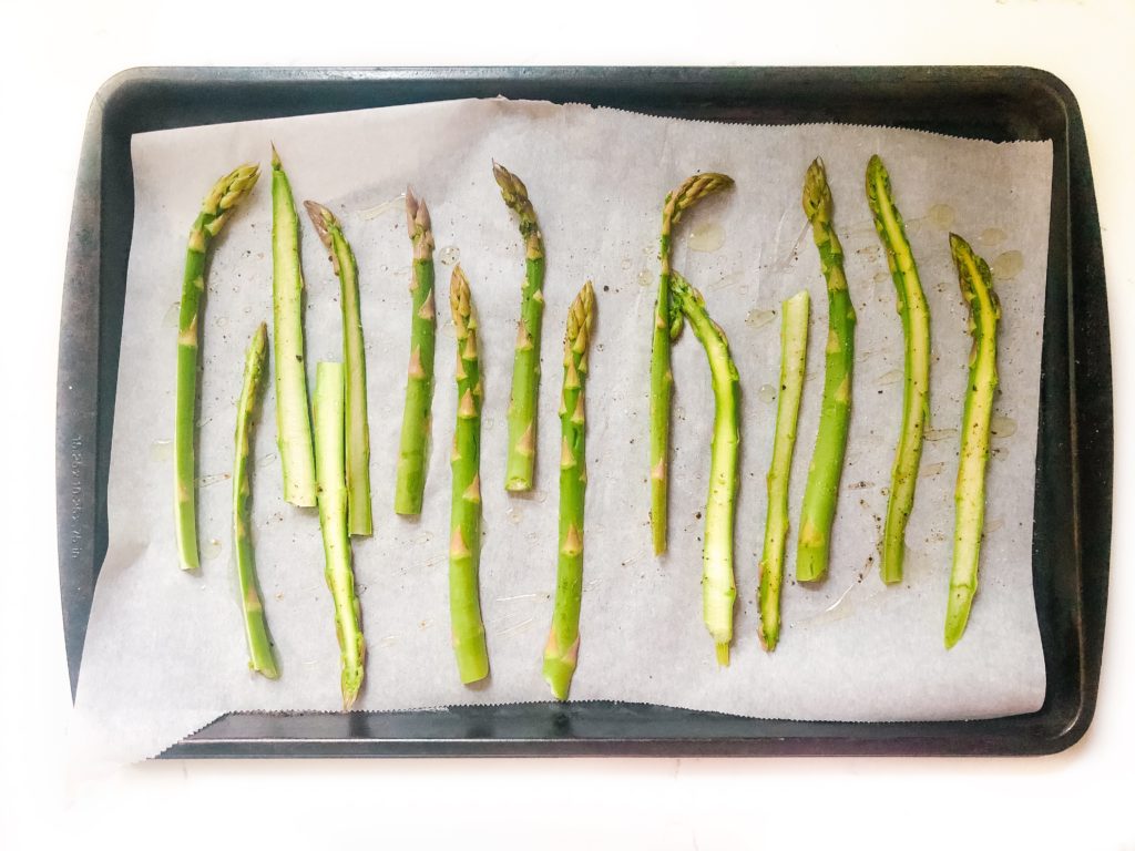 asparagus on a baking sheet