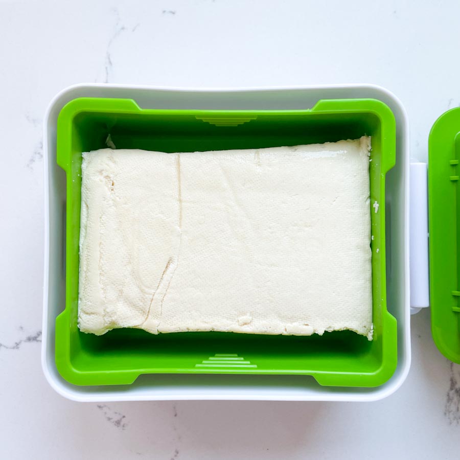 Easy honey garlic tofu - tofu in press