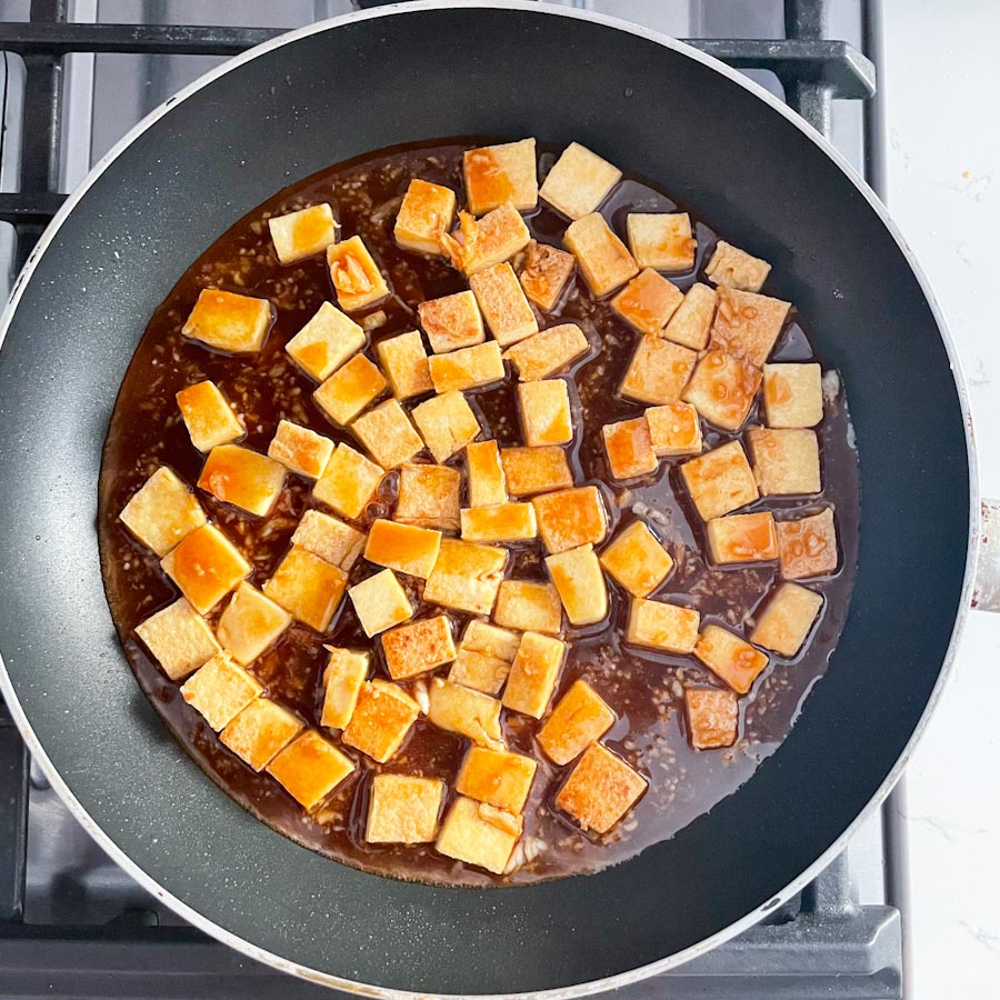 Easy honey garlic tofu - tofu with sauce in a pan